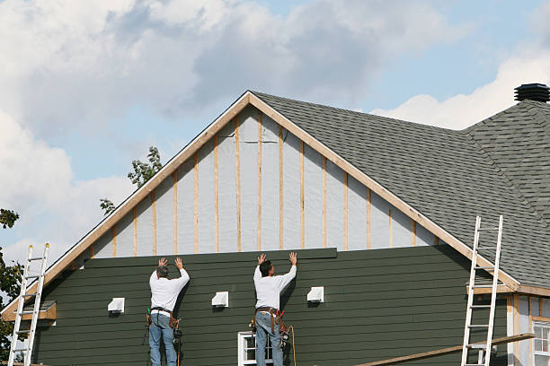 Professional Emergency Siding Repair technician working in Belle Center, OH
